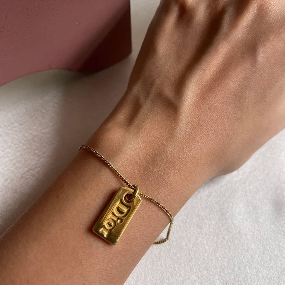 Dior Gold Bracelet with Logo Pendant